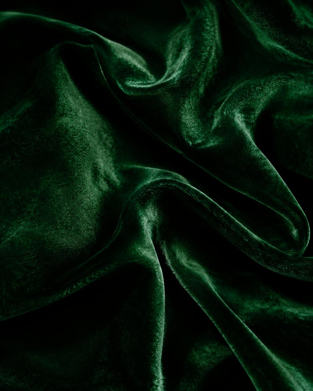 Deep forest-green velvet folds